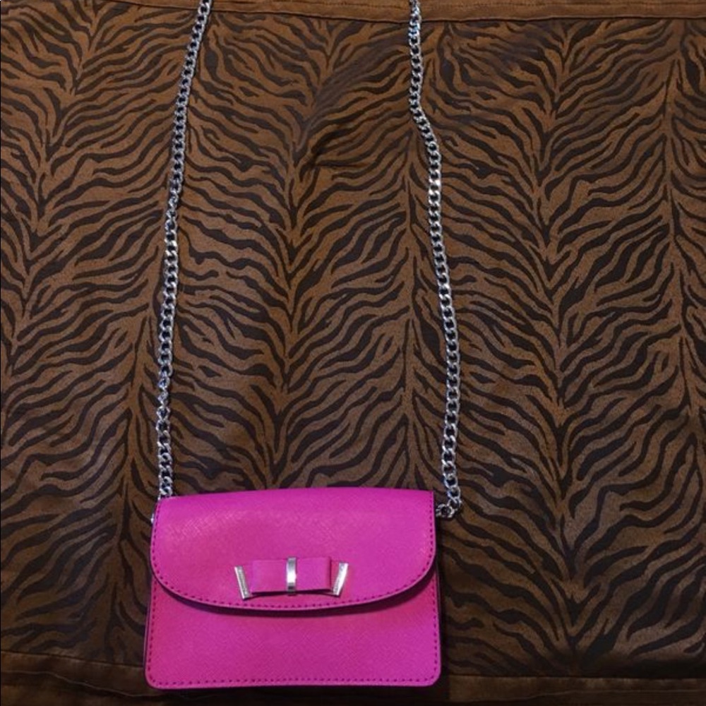 Michael Kors hot pink mini-cross body purse.